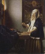 woman holding a balance Jan Vermeer